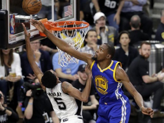 Kevin Durant added to the Spurs' misery with a windmill double-block